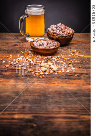 Beer and peanuts Beer and peanuts 98916708