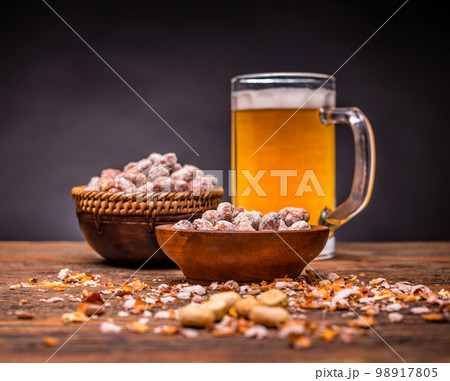 Beer and peanuts Beer and peanuts 98917805