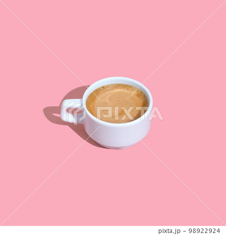 Cups by a pink espresso machine, Sweden. - Stock Image - Everypixel