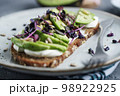 Toast with avocado on plate 98922925
