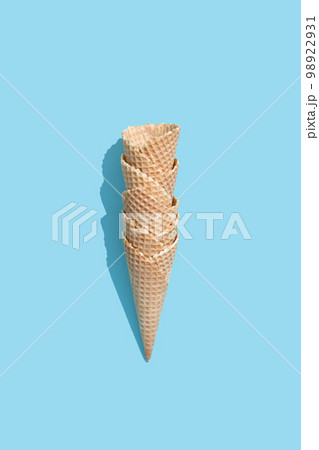Ice cream cone on color background Ice cream cone on color background 98922931