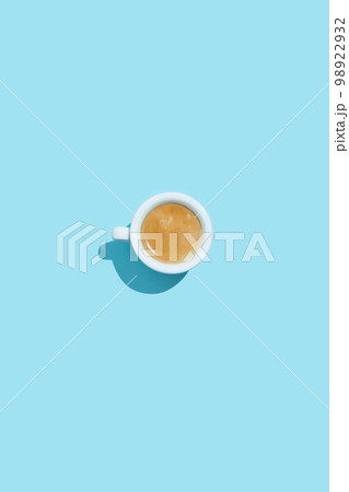 Espresso cup on blue background Espresso cup on blue background 98922932
