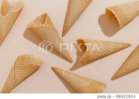 Ice cream cone on color background Ice cream cone on color background 98922933