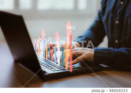 Stock market investments funds and digital assets. Businessman analysing forex trading graph financial data. Business finance technology and investment in 2023 concept. Business finance background. Stock market investments funds and digital assets. Businessman analysing forex trading graph financial data. Business finance technology and investment in 2023 concept. Business finance background. 98926323