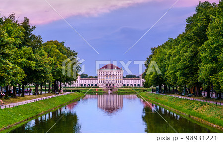 Schloss Nymphenburg, a Baroque palace in Munich, Bavaria at sunset - Germany 98931221