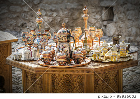 metal utensils made up of copper and brass. Teapots, cups, lamps, jugs, made of gold, brass, handmade silver metal utensils made up of copper and brass. Teapots, cups, lamps, jugs, made of gold, brass, handmade silver 98936002