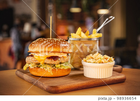 Chicken burger in brioche bun Chicken burger in brioche bun 98936654