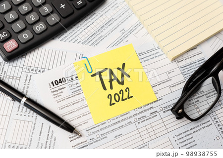 Tax income concept with US tax form Tax income concept with US tax form 98938755