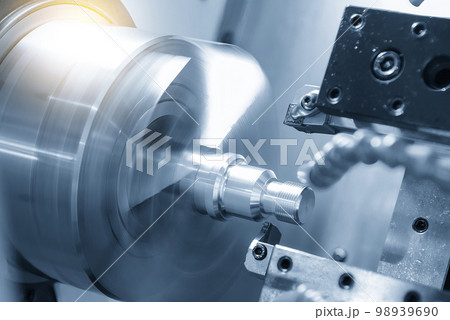 The CNC lathe machine thread cutting at the end of metal stud parts. 98939690