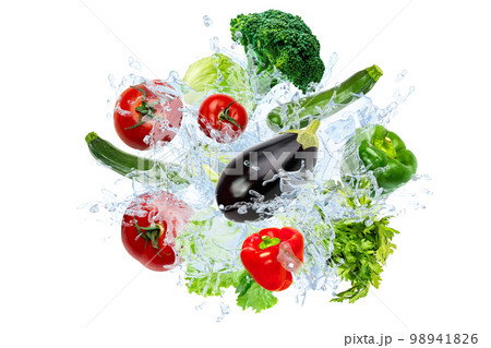Fresh vegetables splashing in clear water splash. Concept healthy diet food diet Fresh vegetables splashing in clear water splash. Concept healthy diet food diet 98941826