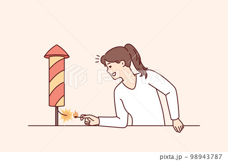 Positive woman with smile sets fire to firecracker wanting to start festive firework 98943787