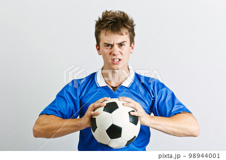 Angry soccer player Angry soccer player 98944001