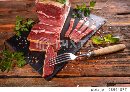 Slice of prosciutto Slice of prosciutto 98944077