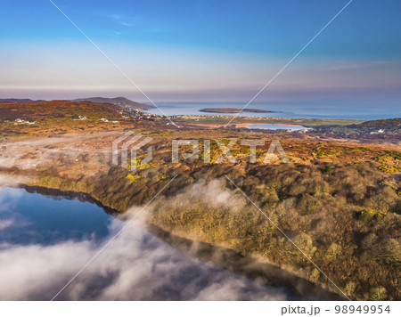 Aerial view of Lough fad in the morning fog, County Donegal, Republic of Ireland Aerial view of Lough fad in the morning fog, County Donegal, Republic of Ireland 98949954