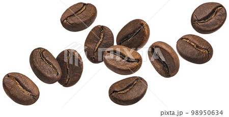 Falling coffee beans isolated on white background Falling coffee beans isolated on white background 98950634