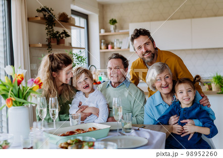 Portrait of happy multigenerational family during Easter dinner. 98952260