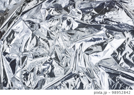 Silver gray crumpled background, metallic. Texture gray silver metallic background. Blank blank mockup. Copy space Silver gray crumpled background, metallic. Texture gray silver metallic background. Blank blank mockup. Copy space 98952842