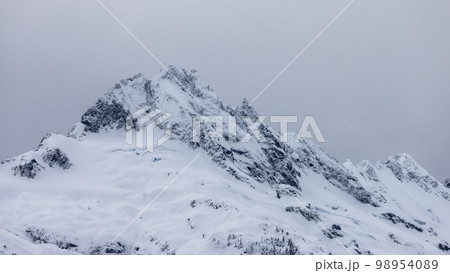 Snow and Cloud covered Canadian Nature Landscape Background. Winter Season in Whistler 98954089
