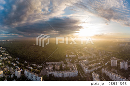 Wide aerial sunrise cloudscape panorama above city 98954348