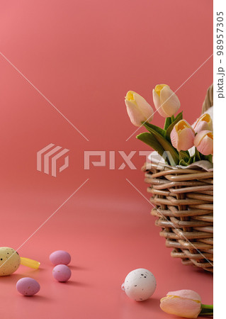 Basket with tulips and eggs 98957305