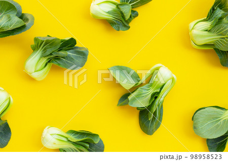Bok choy on yellow background. 98958523