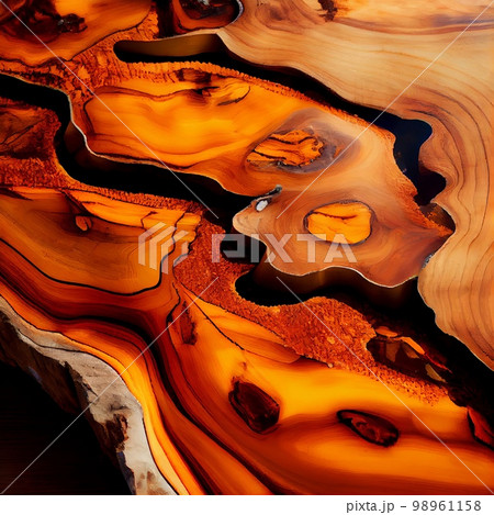 Wood slab with epoxy resin surface abstract background. Decorative interior timber closeup, detailed wooden texture. Natural polished brown wood material abstract pattern. 98961158