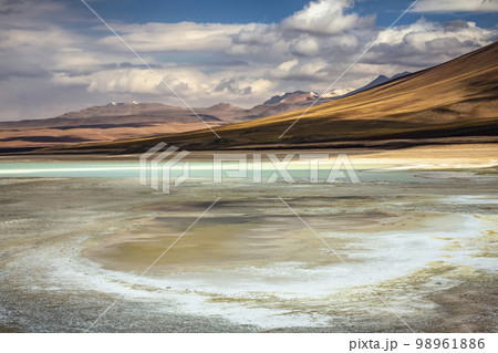 Salt lake, volcanic landscape at Sunset, Atacama, Chile border with Bolivia 98961886