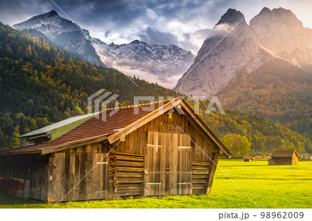 Bavarian alps and rustic farm barn, Garmisch, Zugspitze massif, Bavaria, Germany 98962009