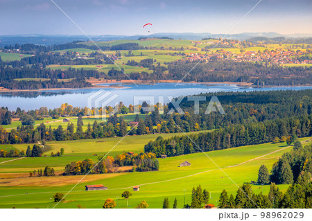Forggensee Lake in Bavarian alps at golden autumn, Bavaria, Germany Forggensee Lake in Bavarian alps at golden autumn, Bavaria, Germany 98962029