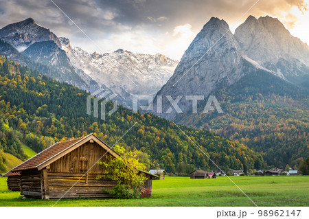 Bavarian alps and rustic farm barn, Garmisch, Zugspitze massif, Bavaria, Germany Bavarian alps and rustic farm barn, Garmisch, Zugspitze massif, Bavaria, Germany 98962147