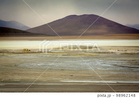 Salt lake, volcanic landscape at Sunset, Atacama, Chile border with Bolivia 98962148