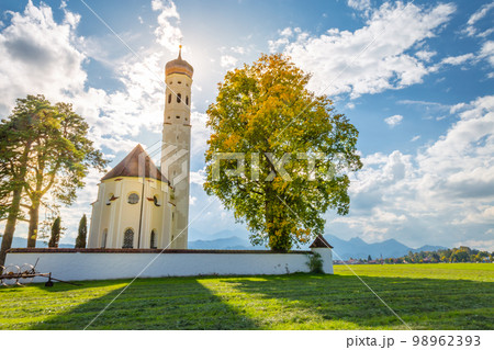 St. Coleman's Church in idyllic Bavarian alps meadows, Schwangau, Germany St. Coleman's Church in idyllic Bavarian alps meadows, Schwangau, Germany 98962393