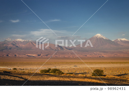 Licancabur and dramatic volcanic landscape at Sunset, Atacama Desert, Chile 98962431