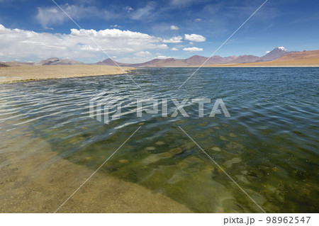 Salt lake, volcanic landscape at sunrise, Atacama, Chile border with Bolivia Salt lake, volcanic landscape at sunrise, Atacama, Chile border with Bolivia 98962547