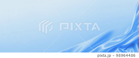 ドレープのあるシルクの青い布の背景テクスチャー 98964486