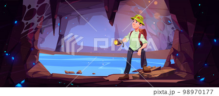Hiker man travel in mountain cave Hiker man travel in mountain cave 98970177