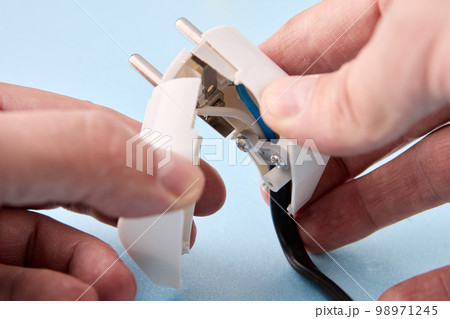Collapsible electrical plug for power cord is designed for European standard electrical outlets. 98971245