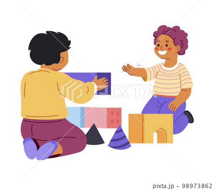 Children playing games with building blocks cubes Children playing games with building blocks cubes 98973862