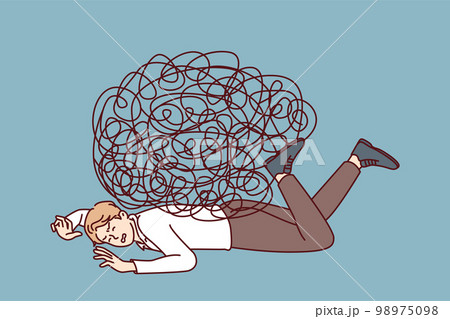 Depressed businessman lies on ground face down under heavy load of tangled lines 98975098