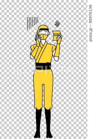 A woman dressed as a ninja who is depressed looking at her bankbook 98976136