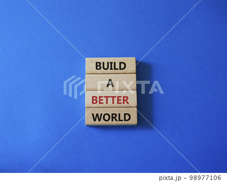 Build a better world symbol. Concept words Build a better world on wooden blocks. Beautiful blue background. Business and Build a better world concept. Copy space. 98977106