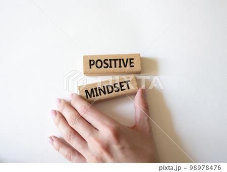 Positive Mindset symbol. Concept words Positive Mindset on wooden blocks. Businessman hand. Beautiful white background. Business and Positive Mindset concept. Copy space. Positive Mindset symbol. Concept words Positive Mindset on wooden blocks. Businessman hand. Beautiful white background. Business and Positive Mindset concept. Copy space. 98978476