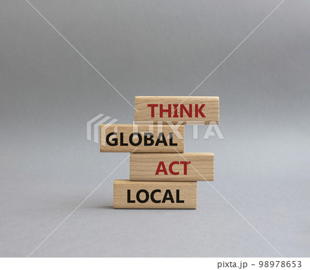 Think global act local symbol. Wooden blocks with words Think global act local. Beautiful grey background. Business and Think global act local concept. Copy space. 98978653