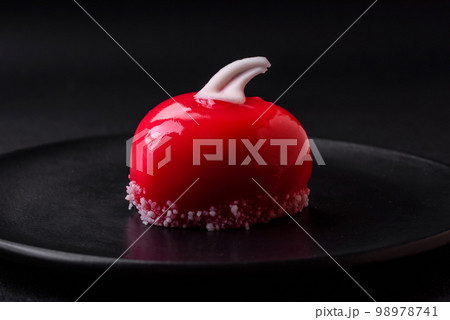 Beautiful tasty cake red color cheesecake in the shape of a heart 98978741