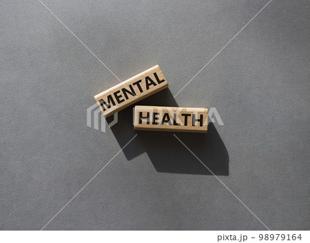 Mental health symbol. Wooden blocks with words Mental health. Beautiful grey background. Business and Mental health concept. Copy space. 98979164