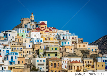 Hillside colorful homes in the old tradition village Olympos Hillside colorful homes in the old tradition village Olympos 98979547