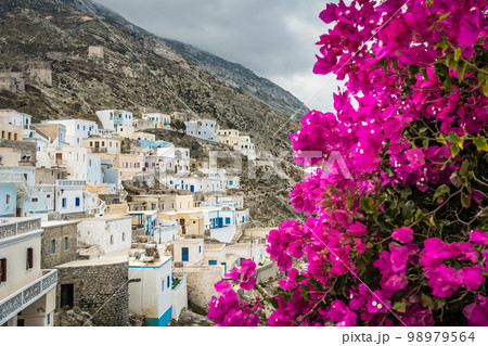 Hillside colorful homes in Olymbos 98979564