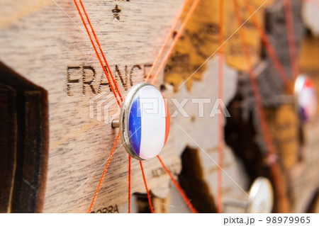 France flag pins and red thread for traveling and planning trips. Planning of logistics routes or spheres of influence in geopolitics 98979965