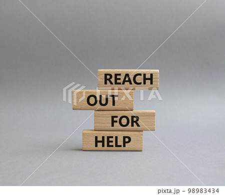 Reach out for help symbol. Wooden blocks with words Reach out for help. Beautiful grey background. Business and Reach out for help concept. Copy space. Reach out for help symbol. Wooden blocks with words Reach out for help. Beautiful grey background. Business and Reach out for help concept. Copy space. 98983434