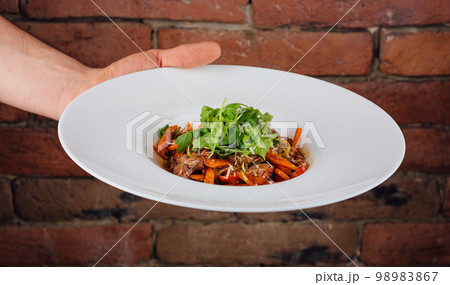 veal with carrots and arugula in plate veal with carrots and arugula in plate 98983867